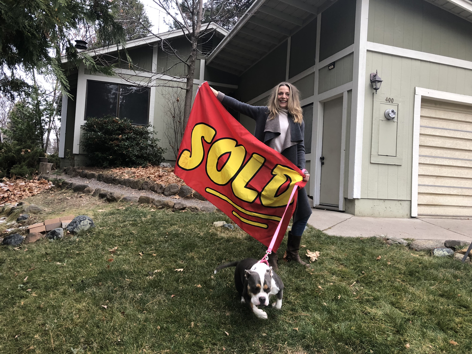 Woman with dog at new home
