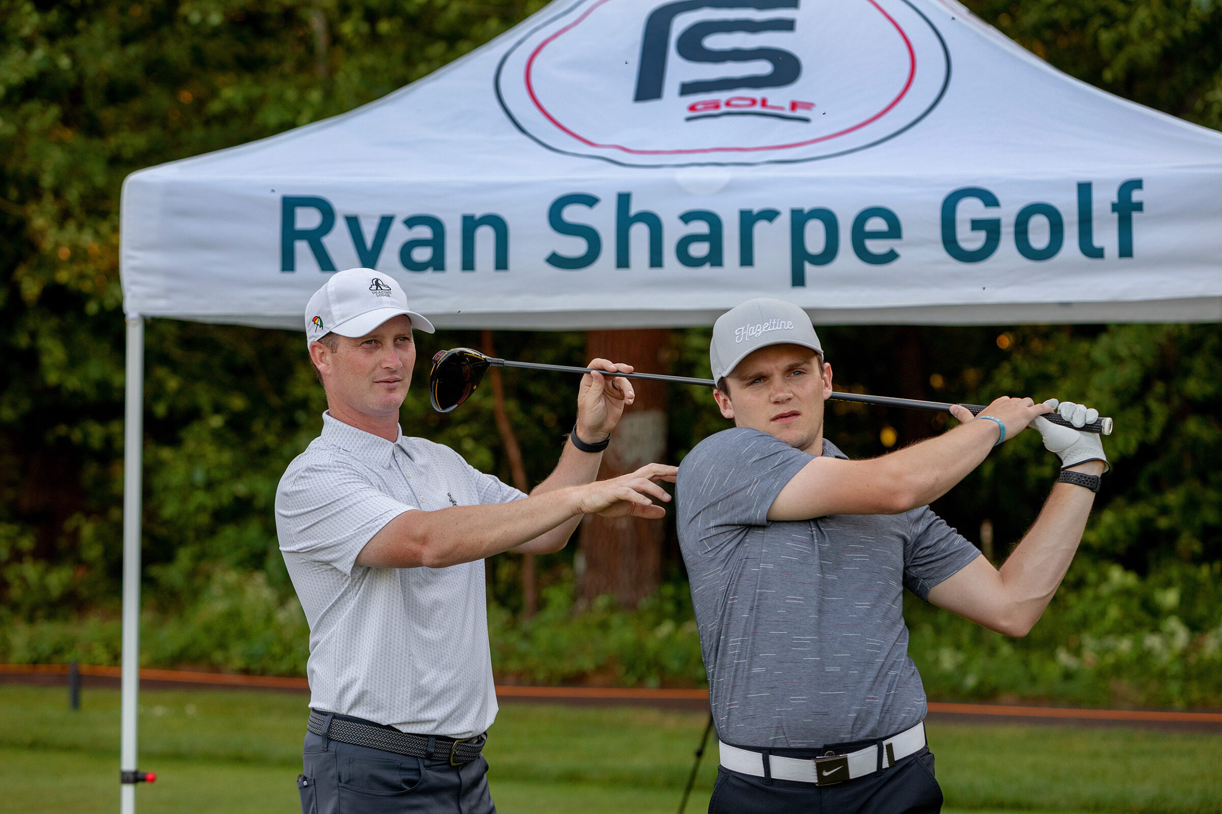 Ryan coaching a student